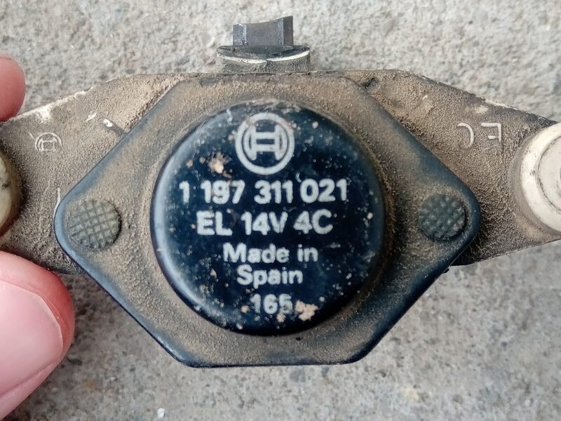 Alternator with voltage regulator