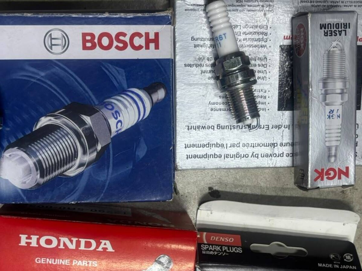 Spark plug boxes from Bosch, NGK, Honda Genuine and Denso